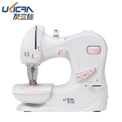 Mini macchina da cucire per uso domestico UFR-601 con lunghezza di cucitura 0-5 mm in colore bianco e rosa